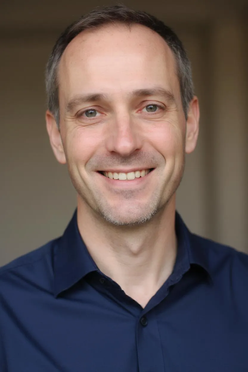 Portrait of Dr. Oliver Thompson